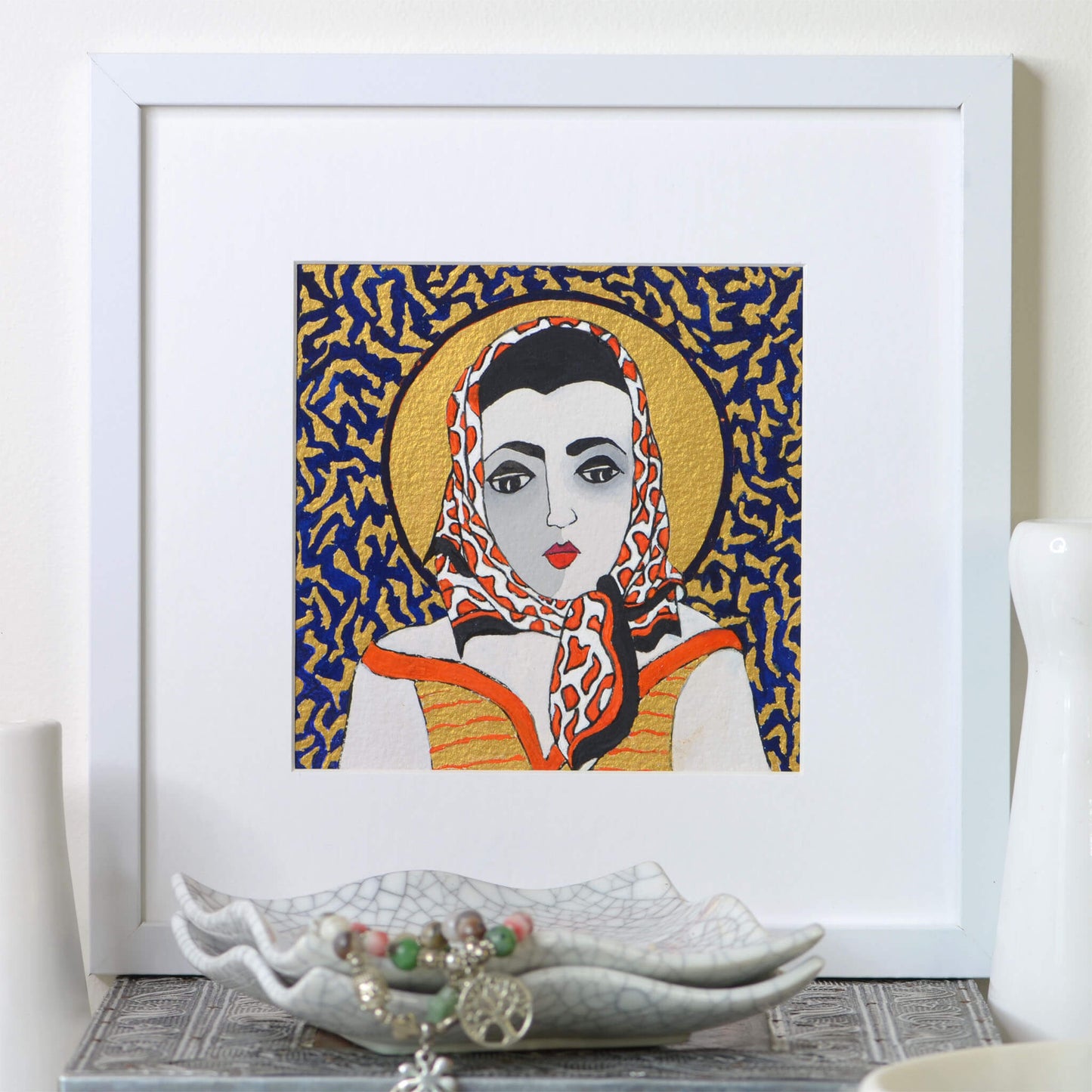 Small, original gouache painting of spiritual feminine power and beauty with golden detail by Ella Que Artist in white single mat